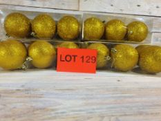 24 x 8cm gold glitter baubles. RRP £23.99