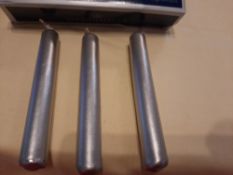 4 x packs small silver candles plus pack of longer candles