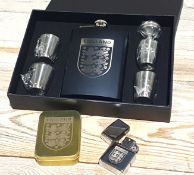 England Football 8oz Black Hip Flask Set and Silver Petrol Lighter. Shot Glasses and Funnel. RRP...
