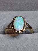 A Stunning 9Ct Gold and Opal Ring. Approximately 0.8 Carats.
