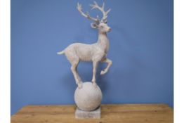 Large Snowy Stag Balancing on Ball Ornament