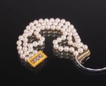 Dreisträngiges Perlarmband, Verschluss 750 GG/WG