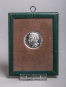Medaille im Glasrahmen