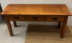 A hardwood sideboard with metal handles (H76cm W150cm D45cm)