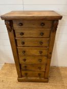 A light oak Wellington chest with graduating drawers (H104cm W51cm D36cm)