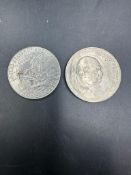 A 1974 US dollar coin along with a Churchill Crown