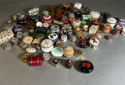 A Large selection of pill boxes to include porcelain, silver etc. Various makers and marks.