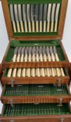 A 1930s Cooper Brothers, Sheffield, 111 piece silver plated service, 12 places, in an oak canteen