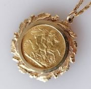 An Edwardian gold full sovereign, 1907, on a 9ct gold mount and neck chain, 15.3g