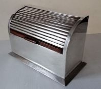 An Edwardian silver desk stationery holder with tambour front, wood-lined sectioned interior