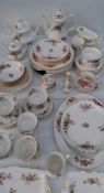 A seventy piece Royal Albert 'Moss Rose' tea and part dinner service 