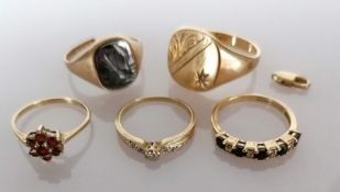 A large yellow gold signet ring with etched and diamond decoration, size X; a seal ring
