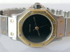 A Santos de Cartier ladies automatic wristwatch with yellow gold and stainless steel bracelet