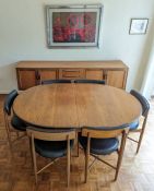 A G-Plan Fresco extending teak dining, 73.5 h x 208 w x 112 cm d (162 cm extended) and six chairs