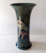 An early 20th century William Moorcroft Claremont Toadstool pattern vase on a blue/green ground