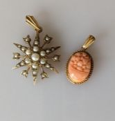 A Victorian-style gold star pendand with seed pearl decoration, 25mm and a carved oval coral pendant