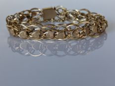 A vintage yellow gold fancy-link bracelet, 14 cm, stamped 14k