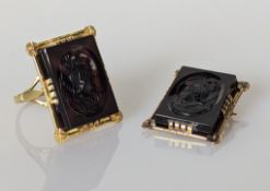 A French-style hard stone cameo ring on a yellow gold setting and matching brooch