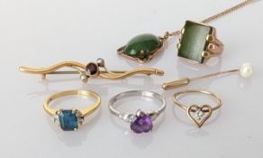 An emerald-cut topaz ring in an 18ct yellow gold claw setting, 8 x 5mm