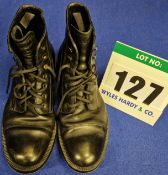 A Pair of PRADA Men's Black 100 per cent Calf Skin Leather Combat Lace-Up Boots with Cleated Sole,
