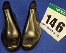 A Pair of GUCCI Solid Wood Shoe Stretchers in Dark Polished Wood