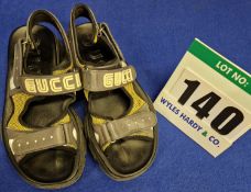 A Pair of GUCCI Aguru Reflective Sandals with Grey Leather and Tan Mesh Uppers with Black Rubber