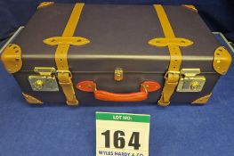 A GLOBE-TROTTER Centenary Carry-On 2-Wheel Trunk Suitcase in Navy Leather with Caramel Leather