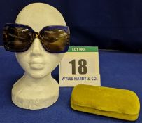 A Pair of GUCCI Sunglasses with Square Royal Blue Glitter Resin Frame and Imitation Tortoiseshell
