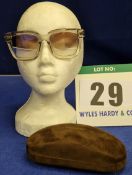 A Pair of TOM FORD Sari Sunglasses with Translucent Grey Plastic Frames and Graduated Bordeaux