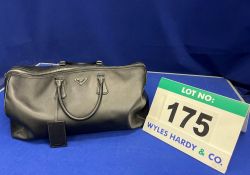 A PRADA Black Saffiano Leather Weekend Bag/Holdall with PRADA Logo Nylon Textile Lining and Two