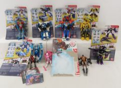 9 Transformers toys, some with Cards