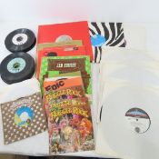Collection of 45's and misc records