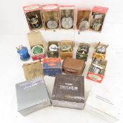 Vintage fishing reels in boxes
