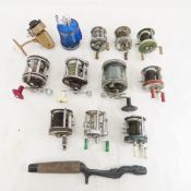 11 Vintage fishing reels, 1 handle, 1 Avon