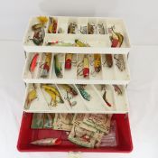 Vintage tackle box with lures and gear