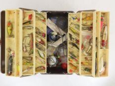 Vintage tackle box with lures and gear