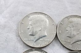 9 Kennedy Half Dollars 6 1966, 2 1967, 1 1969 40%