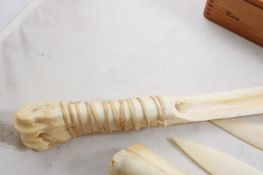 2 Carved Bone Knives, 1 Bone Club, 2 Bone Spear