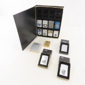 12 Zippo Lighters in collector case