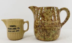2 Farmer's Co-Op advertising pitchers