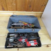 Plastic toolbox full of mixed hand tools