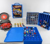 4 Hot Wheels Cases with Assorted Cars