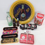 Coca Cola collectibles, tins, pens, cards, bottles