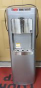 5 Gallon Water cooler/heater- with 1 empty bottle