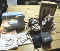 Kenmore Mini Ultra Sewing Machine & More