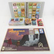 Pokemon Cards in binder, some new, 1 graded