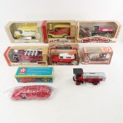 8 ERTL Diecast banks with boxes