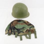 WWII US M1 rear seam helmet with liner