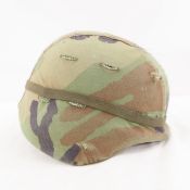US Military helmet with camouflage cover