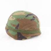 US Military helmet with camouflage cover